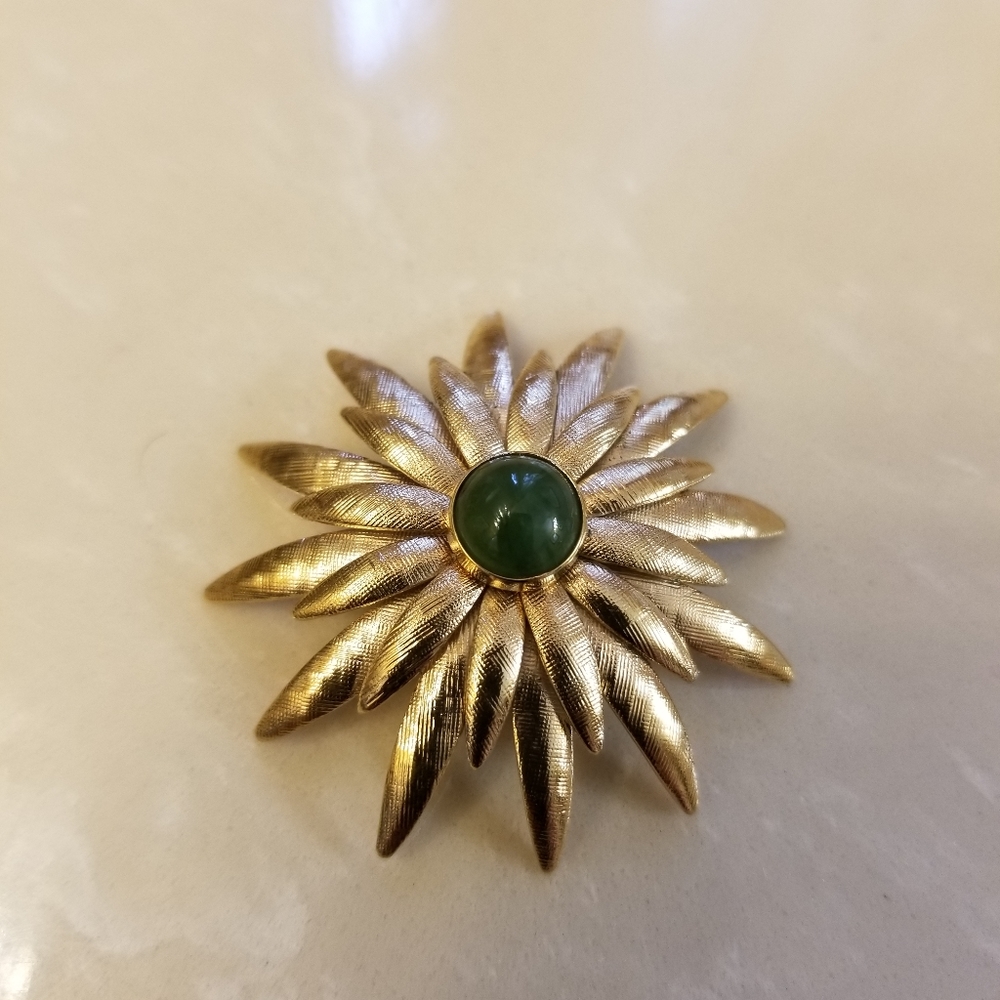 Karatclad jade brooch